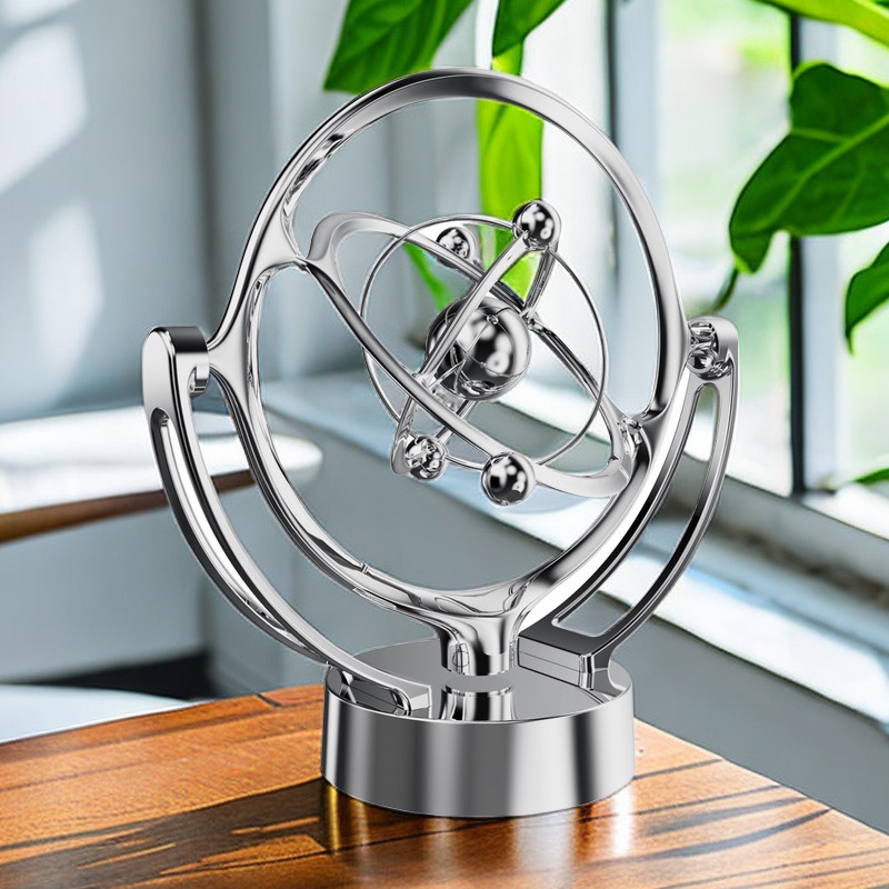 New Earth Kinetic Orbital Revo - Newton Cradle Large recensie en prijs